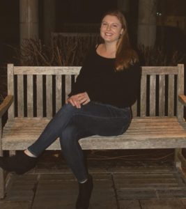 Rachel Dultz sitting on a bench.